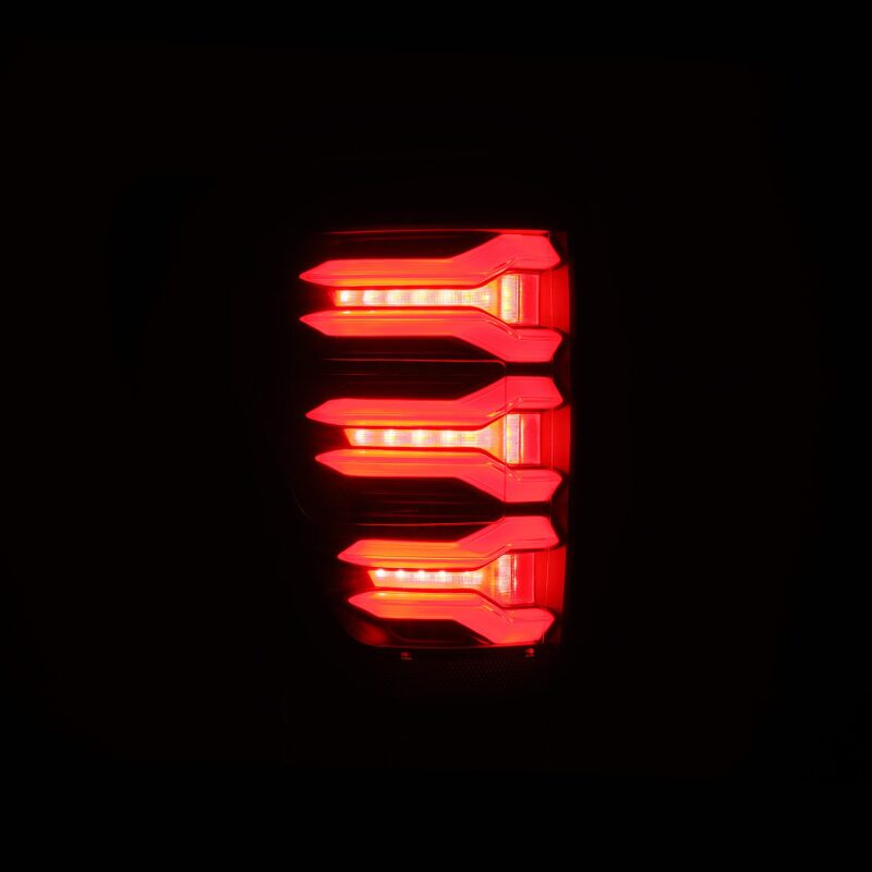 AlphaRex LUXX LED taillights for 2021-2022 Ford F-150, featuring a sleek design with bright red LED illumination.