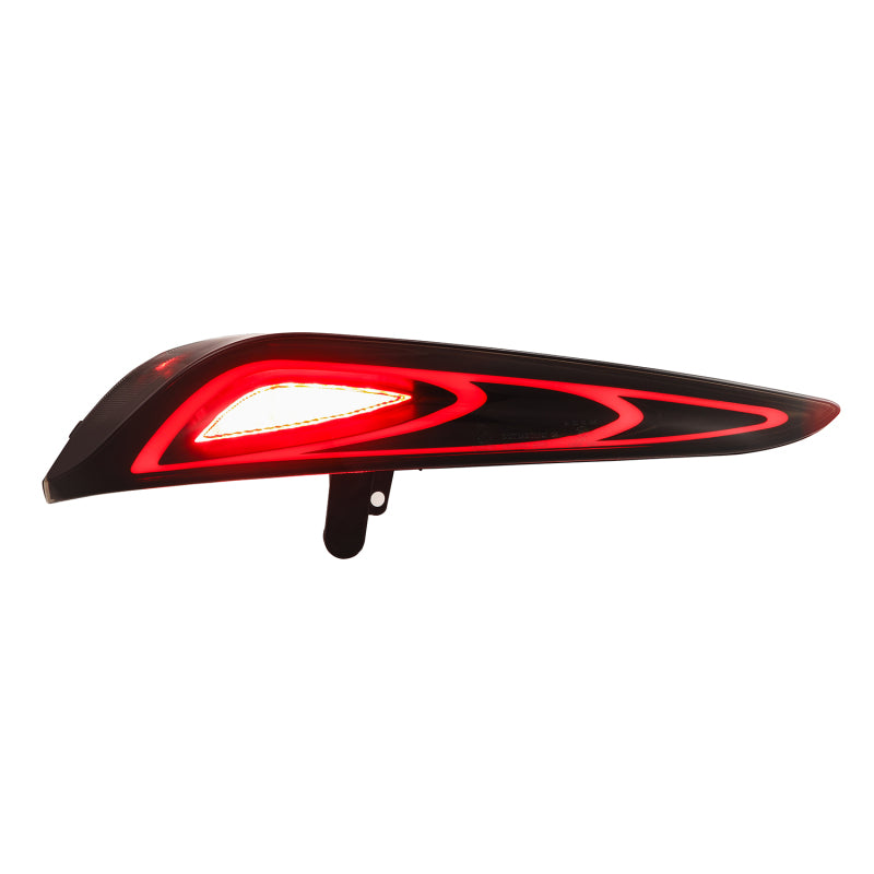 AlphaRex LUXX-Series FT-1 Style LED tail light for 20-24 Toyota Supra in alpha-black finish, featuring dynamic LED design.