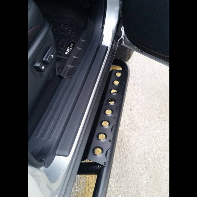 4Runner rock sliders for 2010-2013 models, designed for off-road protection and easy access. Durable and stylish.