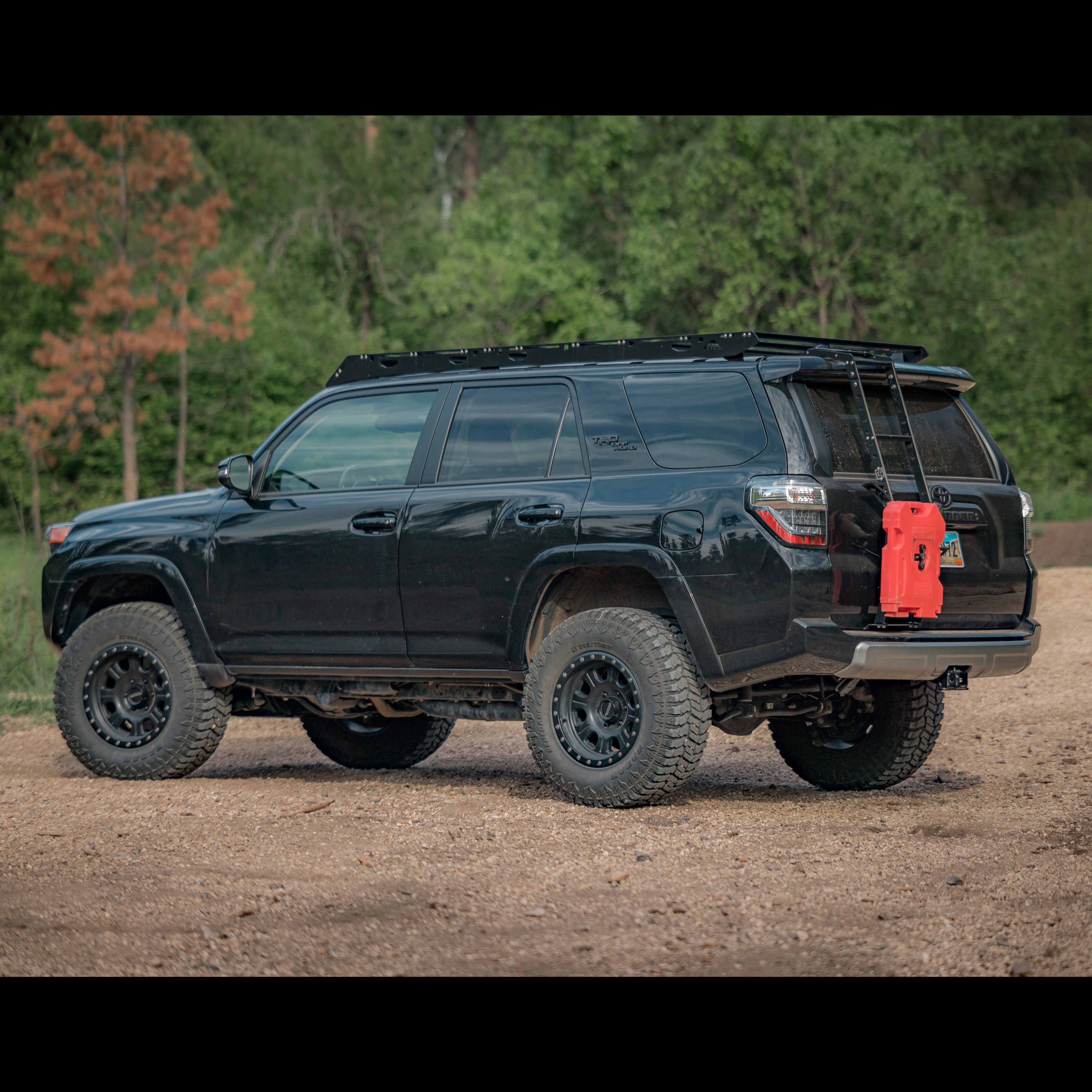 4Runner Summit Hatch Ladder for 5th Gen models, 2010-2024, mounted on a black SUV with offroad tires.