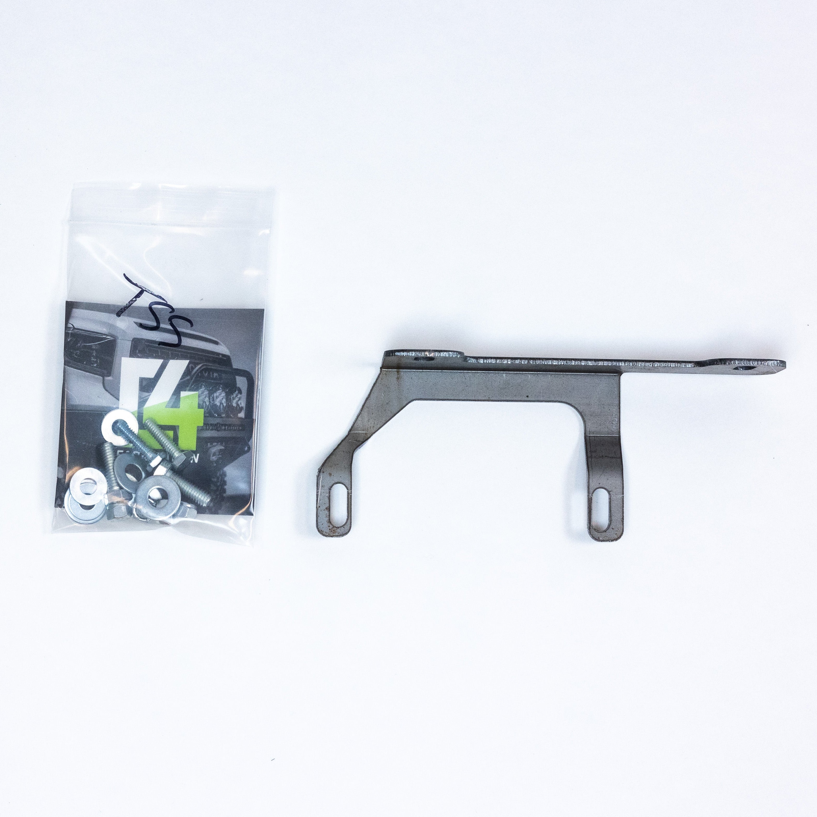 4Runner TSS relocation kit with metal bracket and hardware for optimal sensor positioning in off-road vehicles.