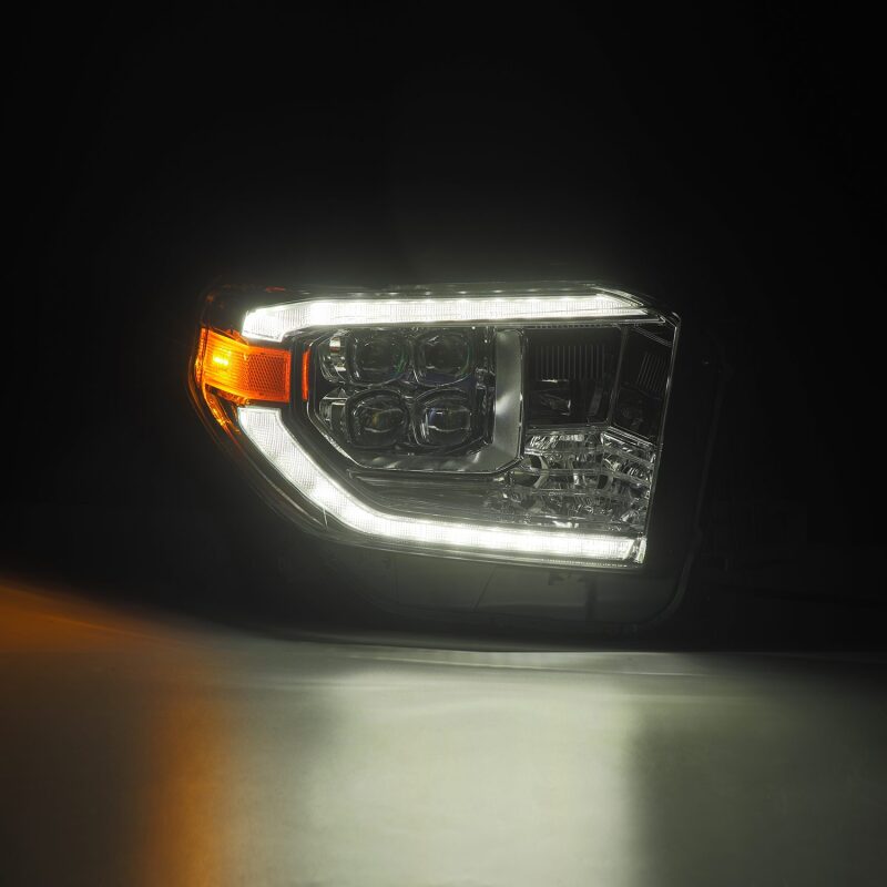 AlphaRex NOVA LED projector headlight for 2014-2021 Toyota Tundra with chrome finish, sequential signal, and switchback DRL.