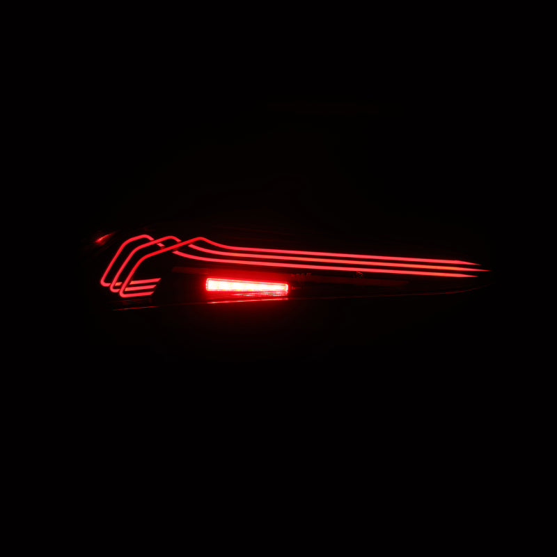 AlphaRex LUXX-Series LED tail lights for 20-24 Toyota Supra in Alpha-Black, showcasing a sleek red laser style design.