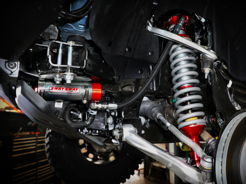 afe Sway-A-Way coilovers installed on a Ford Bronco, showcasing advanced suspension components for enhanced off-road performance.