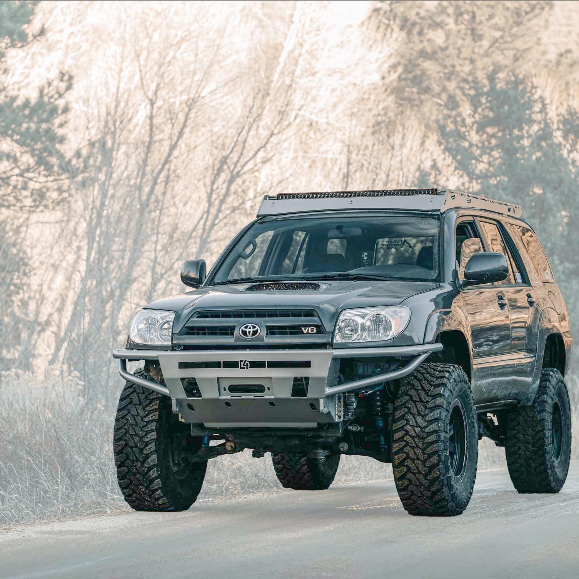 4Runner Hybrid Front Bumper for 2003-2009 models, enhancing off-road capability and rugged appearance. Ideal for adventure.
