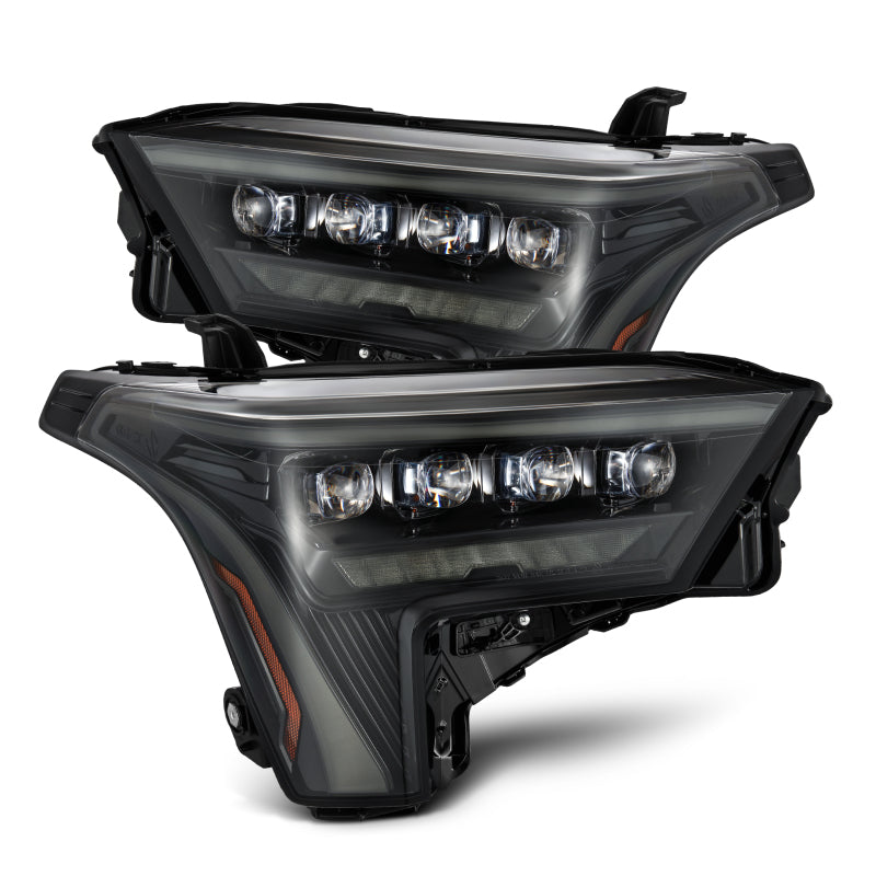 AlphaRex NOVA-Series headlights for 2022-2023 Toyota Tundra in alpha-black with amber daytime running lights.