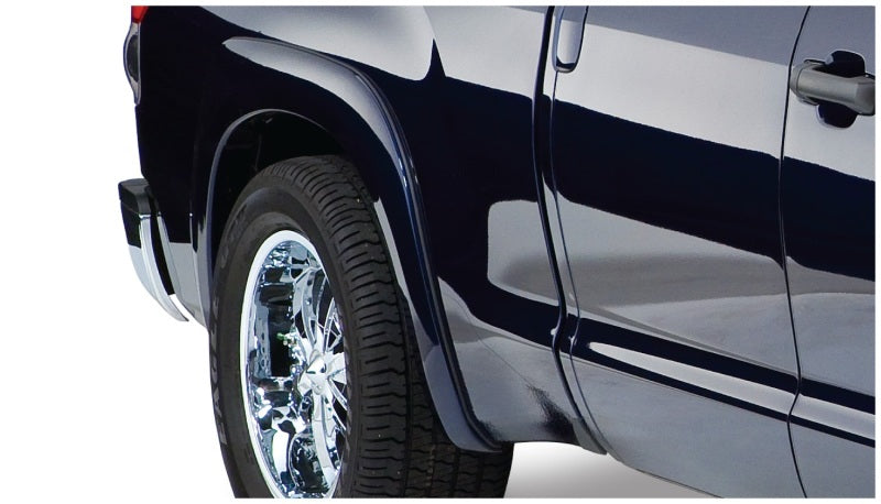 Bushwacker 07-13 Toyota Tundra OE style flares in black, enhancing the truck's appearance and accommodating factory mudflaps.