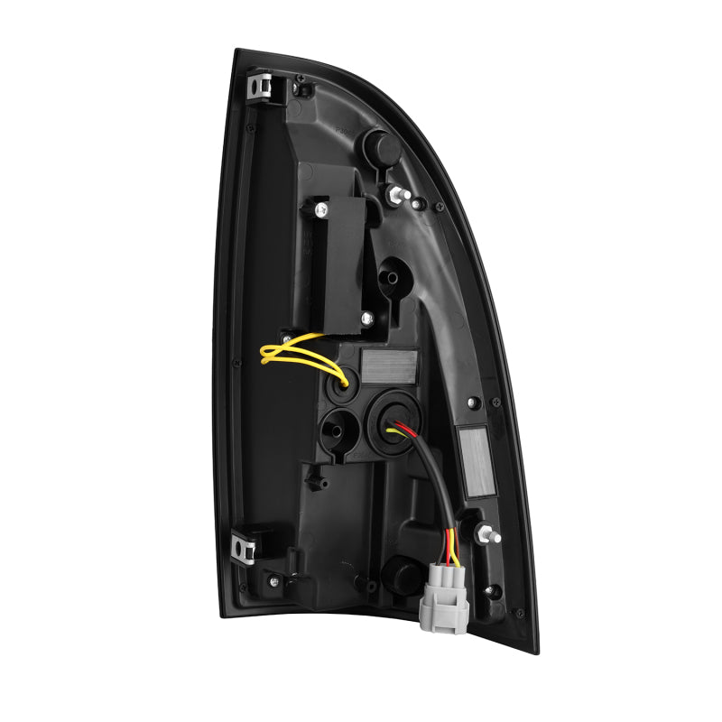 AlphaRex NOVA Prismatic LED tail lights for 05-15 Toyota Tacoma in Alpha-Black, showcasing the back view and wiring connections.