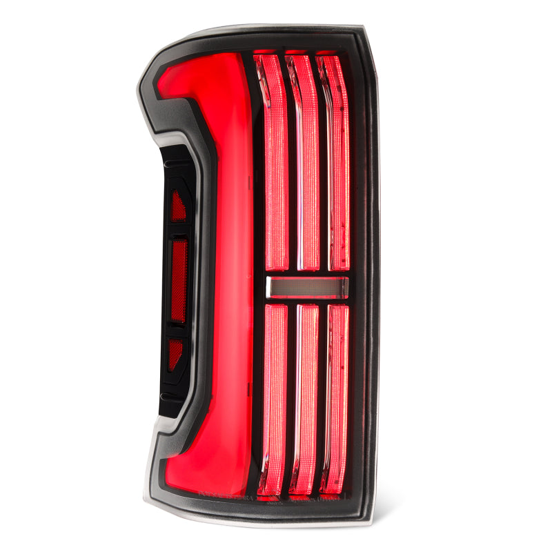 AlphaRex NOVA-Series LED prismatic tail light for 24-25 Toyota Tacoma in black and red, featuring a sleek design.