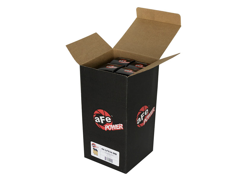 Open box displaying multiple aFe ProGuard oil filters, showcasing the product's packaging and branding.
