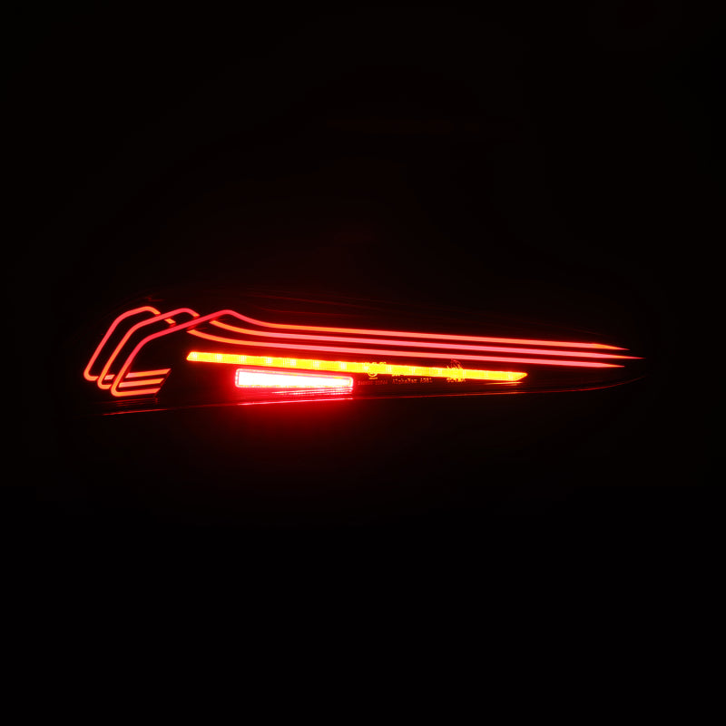 AlphaRex LUXX-Series LED tail lights for 20-24 Toyota Supra in black and red, showcasing a sleek, modern design.