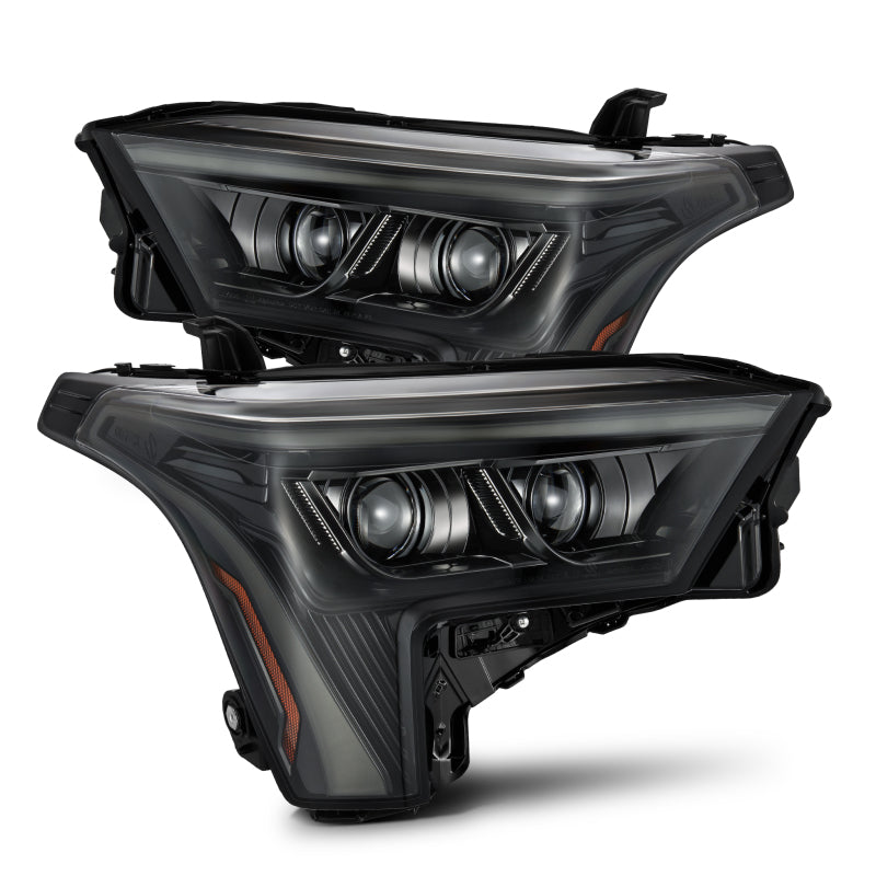 AlphaRex LUXX-Series headlights for 2022-2023 Toyota Tundra in alpha-black with amber daytime running lights.