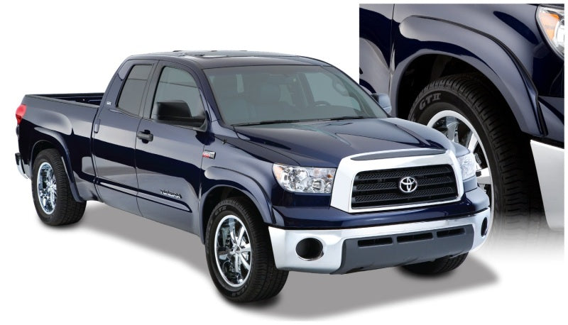 Bushwacker OE style flares for 07-13 Toyota Tundra, black, enhancing truck's look and protection with factory mudflaps.