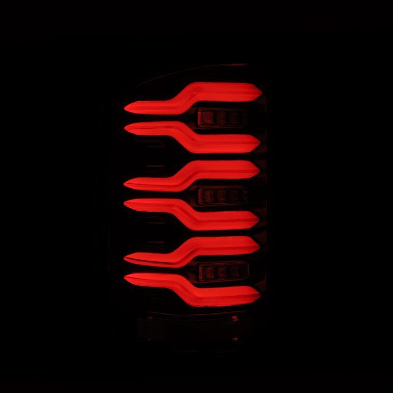 AlphaRex LUXX-Series LED tail lights for 14-18 GMC Sierra models featuring a sleek black design and sequential signal lights.