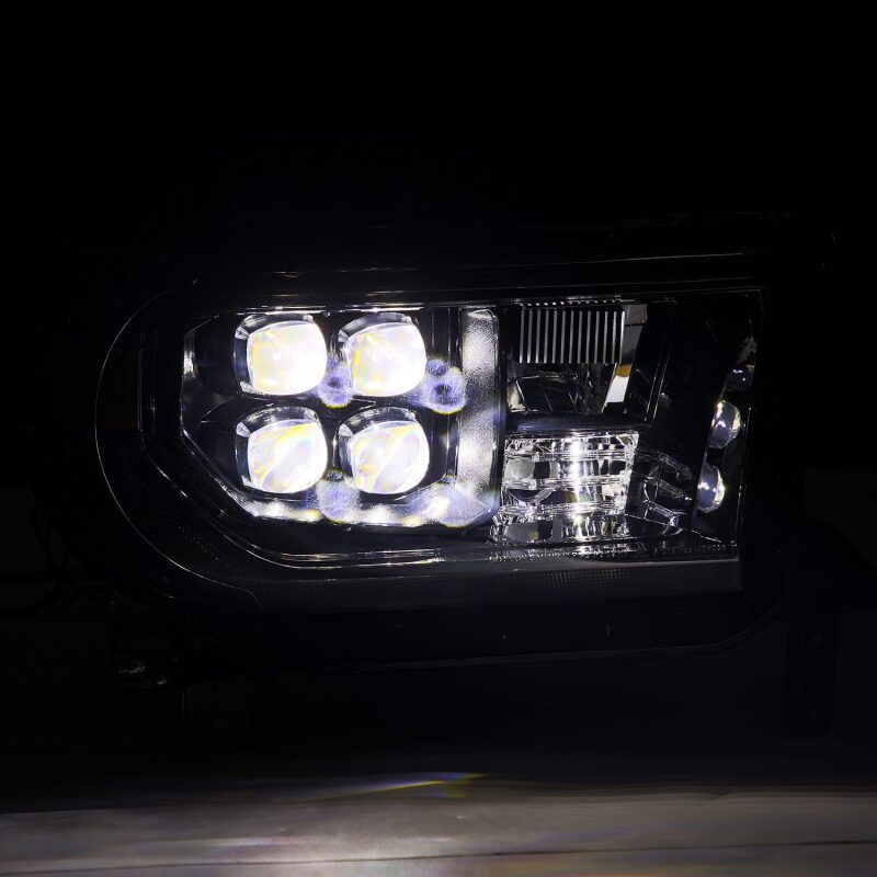 AlphaRex NOVA LED projector headlights for 07-13 Toyota Tundra in alpha-black with sequential signals and DRL.