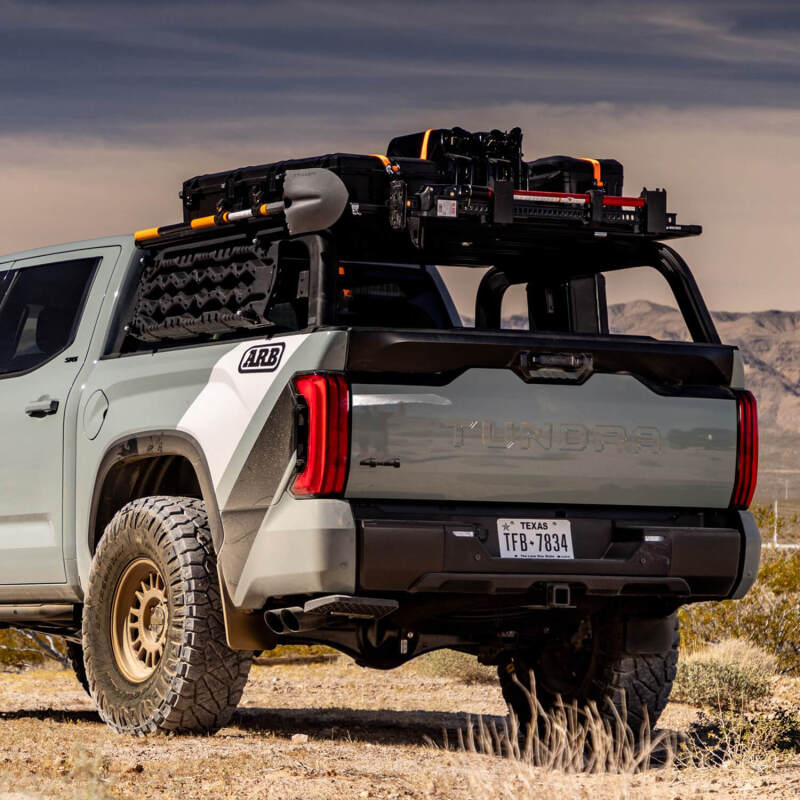 Toyota Tundra with ARB bed rack, showcasing offroad gear and accessories for adventure enthusiasts.