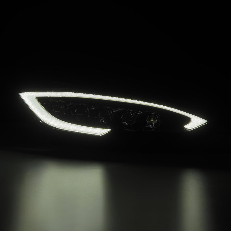 AlphaRex NOVA LED projector headlights for 12-21 Tesla Model S in black with sequential signal and daytime running lights.
