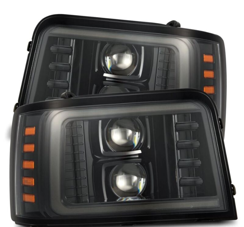 AlphaRex PRO-Series projector headlights for 92-96 Ford F-Series and Bronco in black with sequential signals and DRL.