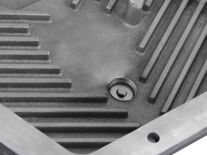 aFe POWER Transmission Pan for Ford Trucks 80-92 featuring a durable design with grooves and a drain plug for AOD transmission.