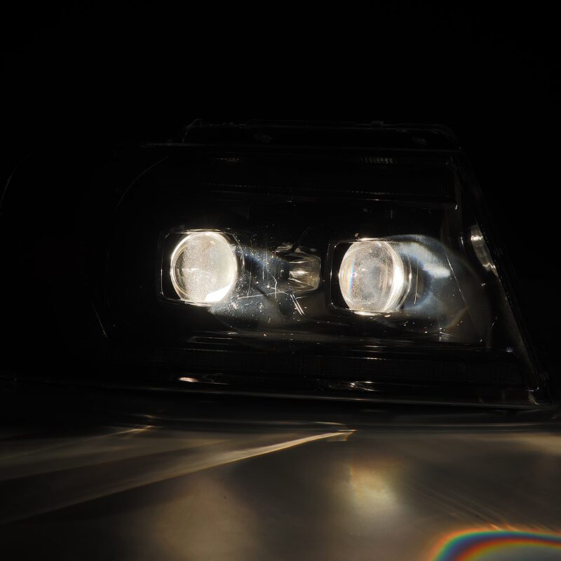 AlphaRex Chrome LUXX Series projector headlights for 2004-2008 Ford F150, showcasing bright illumination and sleek design.