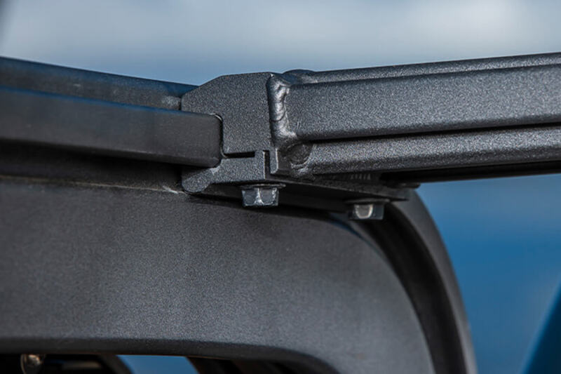 Close-up of ARB 22-25 Toyota Tundra bed rack featuring 55-inch cross bars, showcasing sturdy construction and mounting details.