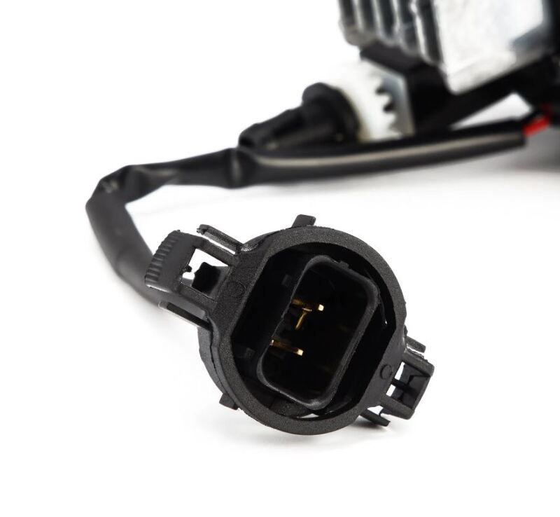 AlphaRex DoubleTap LED projector fog light connector for Chevrolet, GMC, and Pontiac vehicles, featuring a durable design.