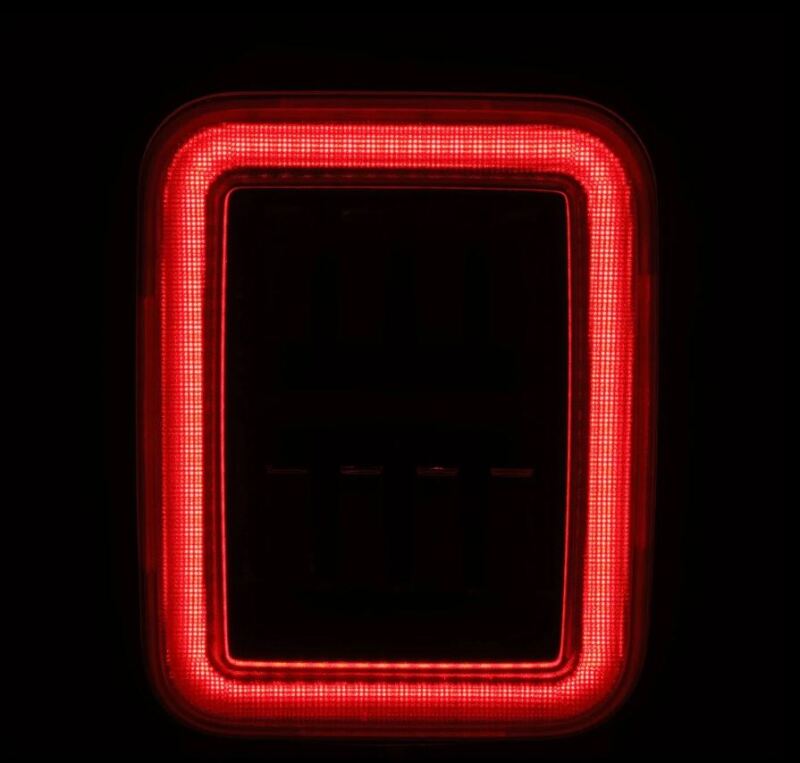 AlphaRex prismatic LED tail light for 19-24 Jeep Gladiator JT in black and red, featuring a sleek design and bright illumination.