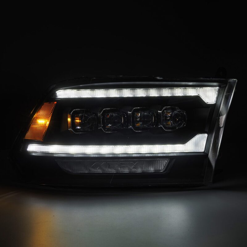 AlphaRex NOVA LED projector headlights for 09-18 Dodge Ram 2500 with plank style design and activation light in black.
