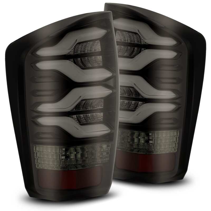 AlphaRex LUXX LED taillights for 16-21 Toyota Tacoma in black and red with sequential signal and activation light.