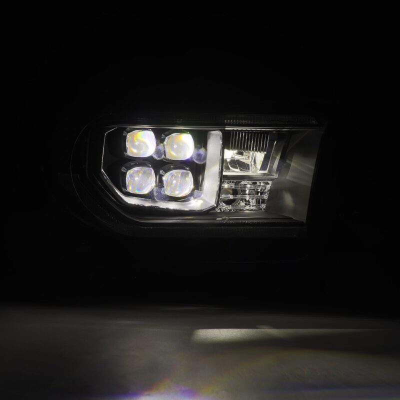 AlphaRex NOVA LED projector headlights for 07-13 Toyota Tundra and 08-17 Sequoia with black housing and sequential signals.