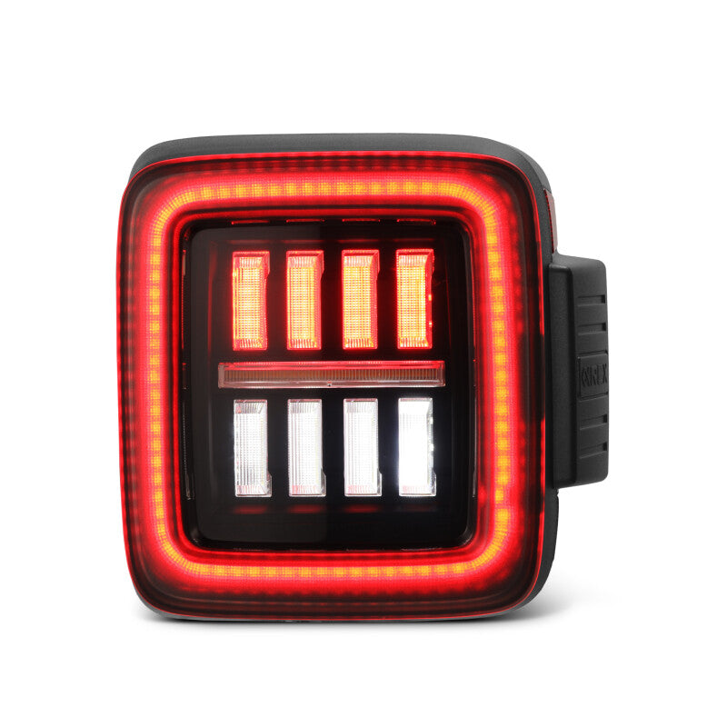 AlphaRex NOVA Prismatic LED taillights for 2018-2023 Jeep Wrangler JL in black and red design, enhancing visibility and style.