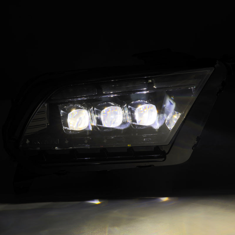 AlphaRex 13-14 Ford Mustang NOVA LED projector headlights in black with active light and sequential signals.