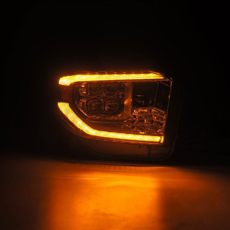 AlphaRex NOVA LED projector headlights for 14-21 Toyota Tundra featuring chrome finish, active light, sequential signal, and switchback DRL.