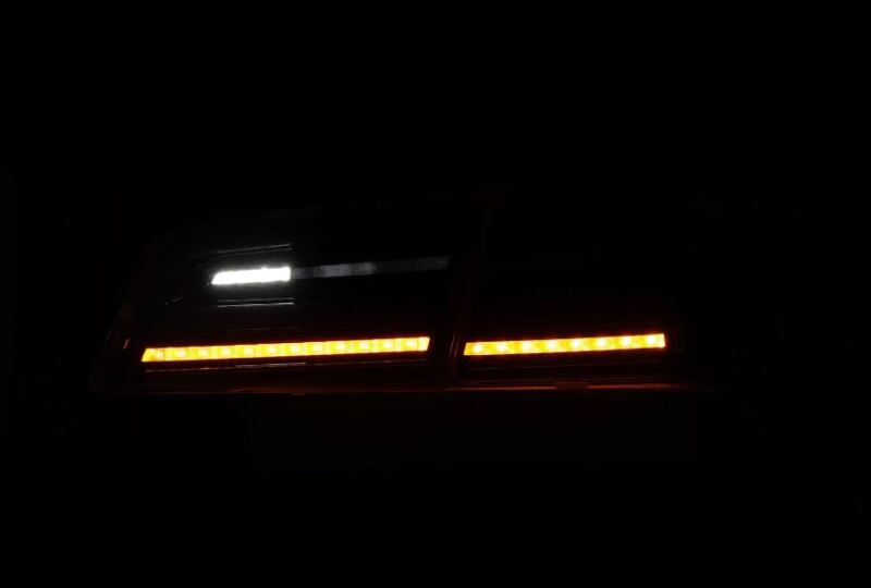 AlphaRex LUXX-Series LED tail lights for 12-21 Tesla Model S in Alpha-Black, featuring sleek design and bright illumination.