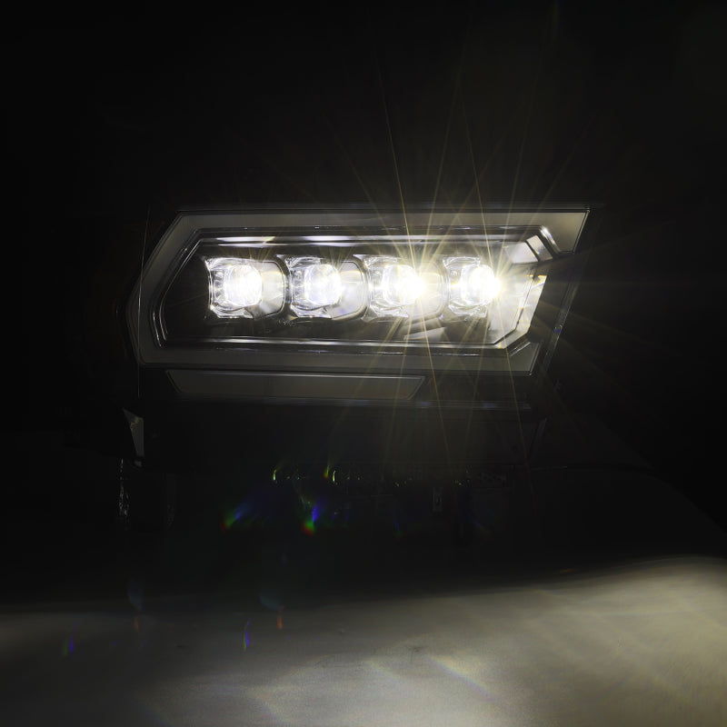 AlphaRex NOVA-Series projector headlights for 2019-2023 Dodge Ram 1500, featuring a sleek black design and bright LED lights.