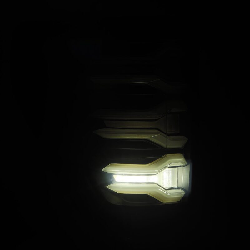 AlphaRex LUXX LED taillights for 2021-2022 Ford F-150, showcasing a sleek, modern design with bright illumination.
