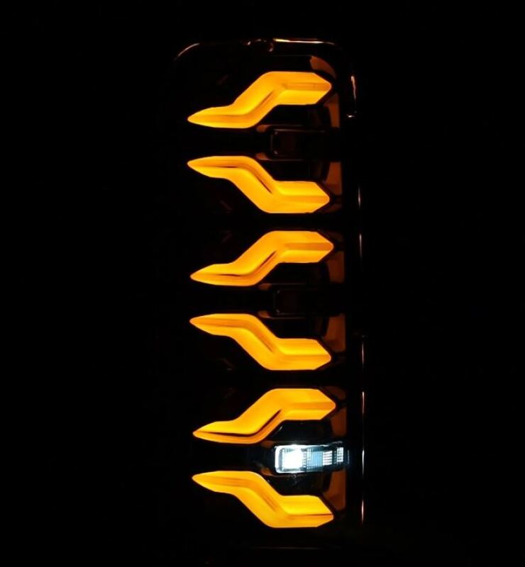 AlphaRex Luxx-Series LED tail lights for 87-96 Ford Bronco and F-150, featuring a sleek black design and bright amber accents.