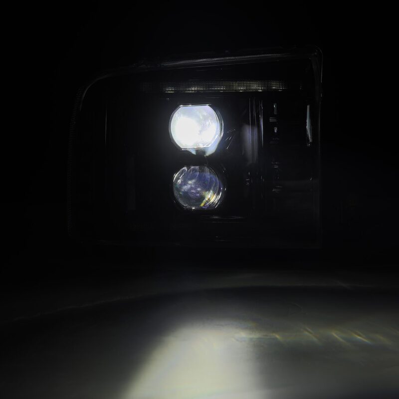 AlphaRex LUXX-Series LED projector headlights for 05-07 Ford Super Duty and Excursion in alpha-black finish.