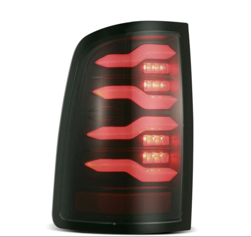 AlphaRex Luxx-Series LED tail light for 09-18 Dodge Ram, featuring a sleek black design with sequential signals and activation light.