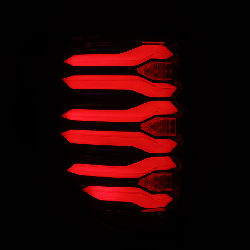AlphaRex LUXX LED taillights for 09-14 Ford F150 with black and red housing, featuring a sleek, modern design.