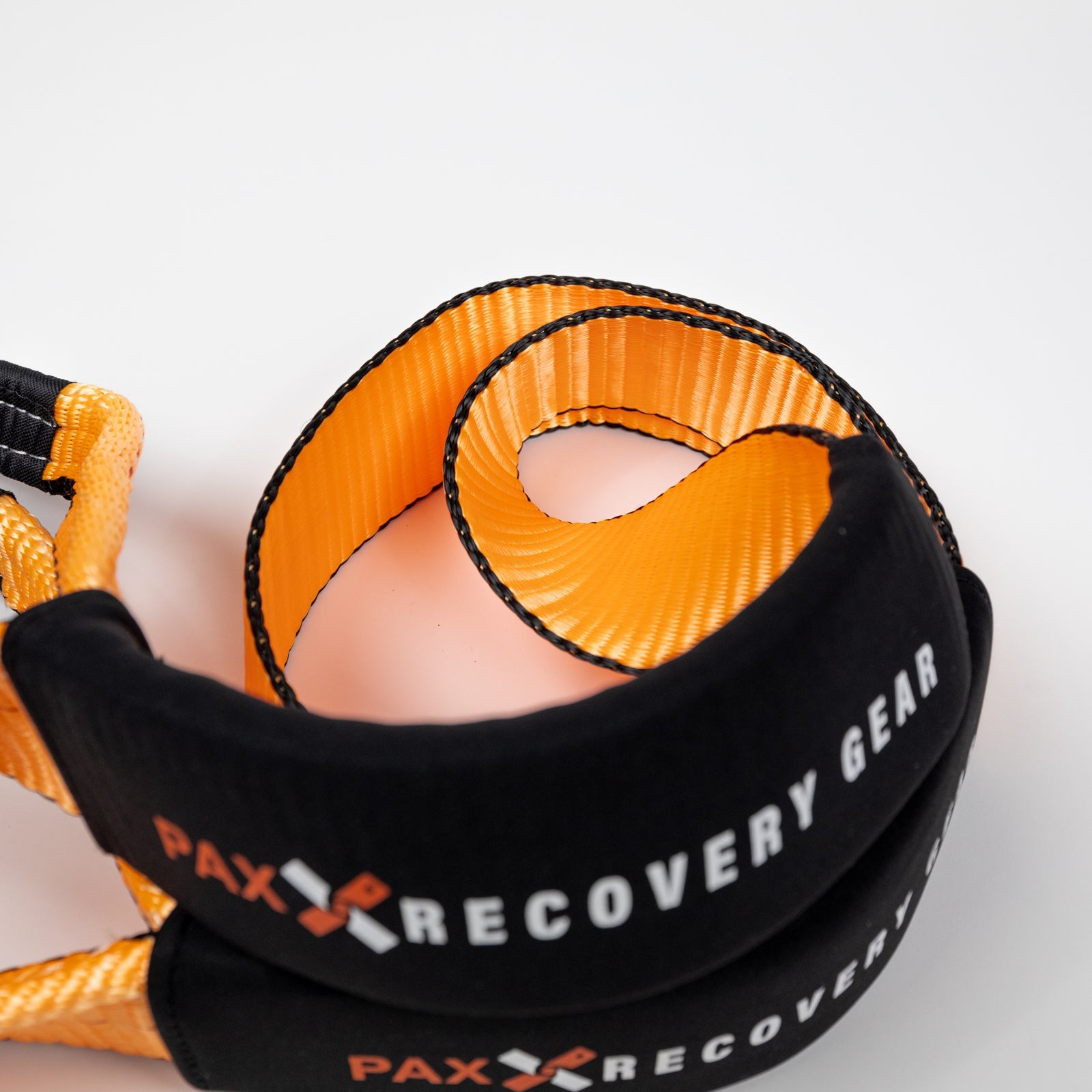 8-foot tree saver strap with durable black and orange material, designed for offroad vehicle recovery.