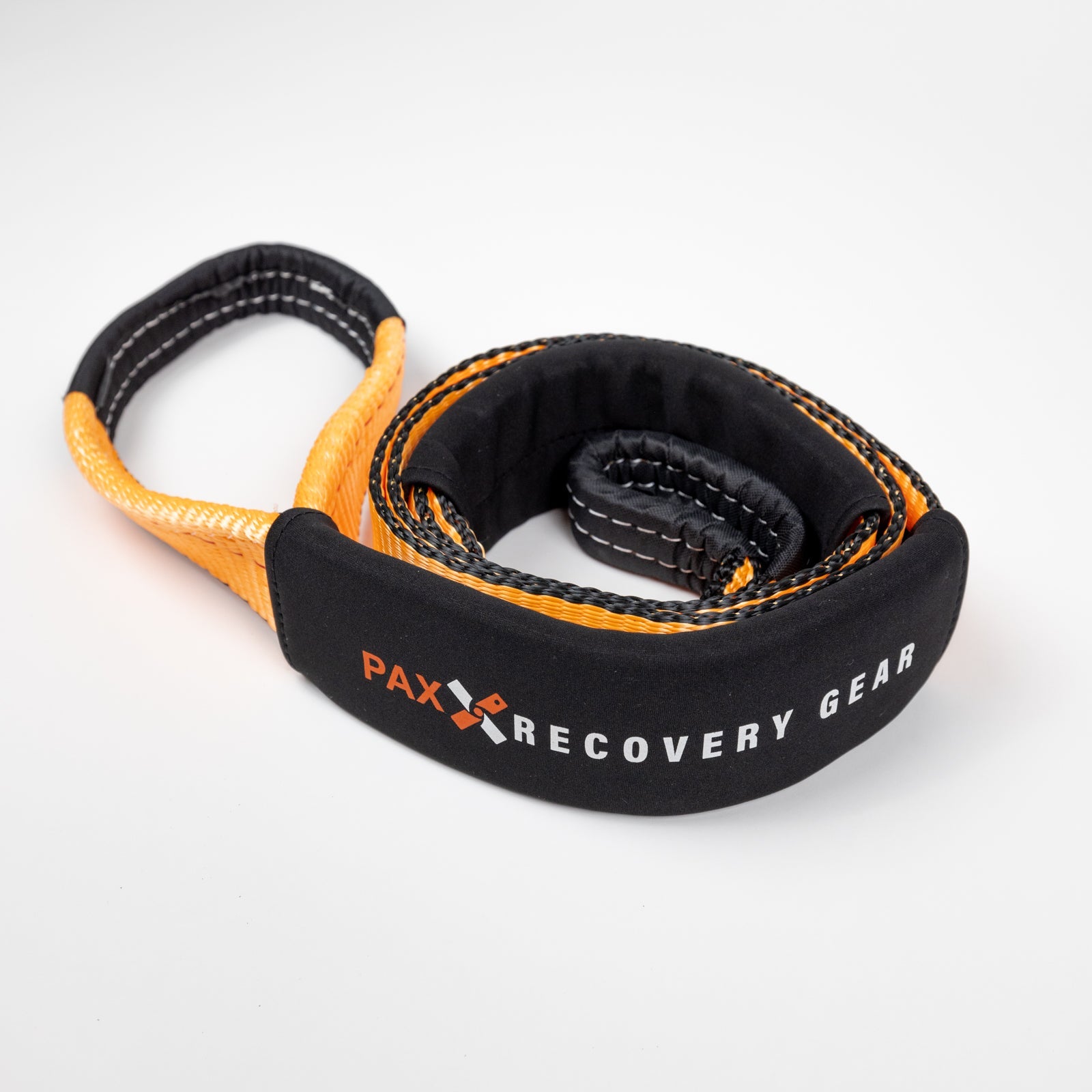 Durable 8-foot tree saver strap designed for offroad recovery, featuring protective padding and strong stitching.