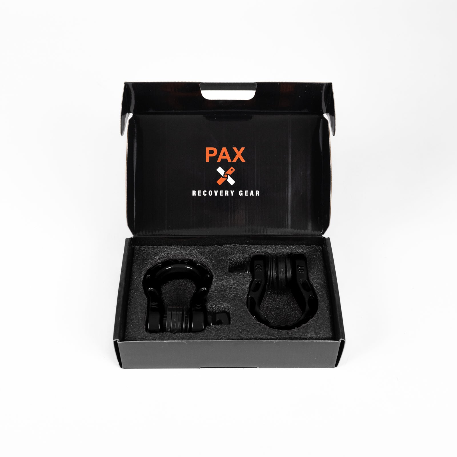 8 Ton D-Ring Shackle in a black box with foam insert, designed for offroad recovery and towing applications.