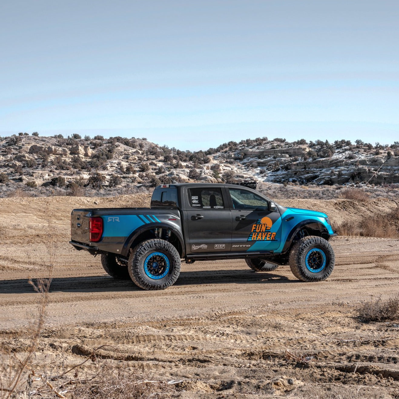 2019-2023 Ford Ranger fenders showcased on a modified truck in an offroad setting, highlighting rugged design and performance.