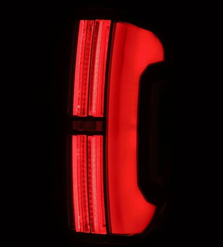AlphaRex 14-21 Toyota Tundra Nova-Series LED tail lights in Alpha-Black with a sleek red design for enhanced visibility.