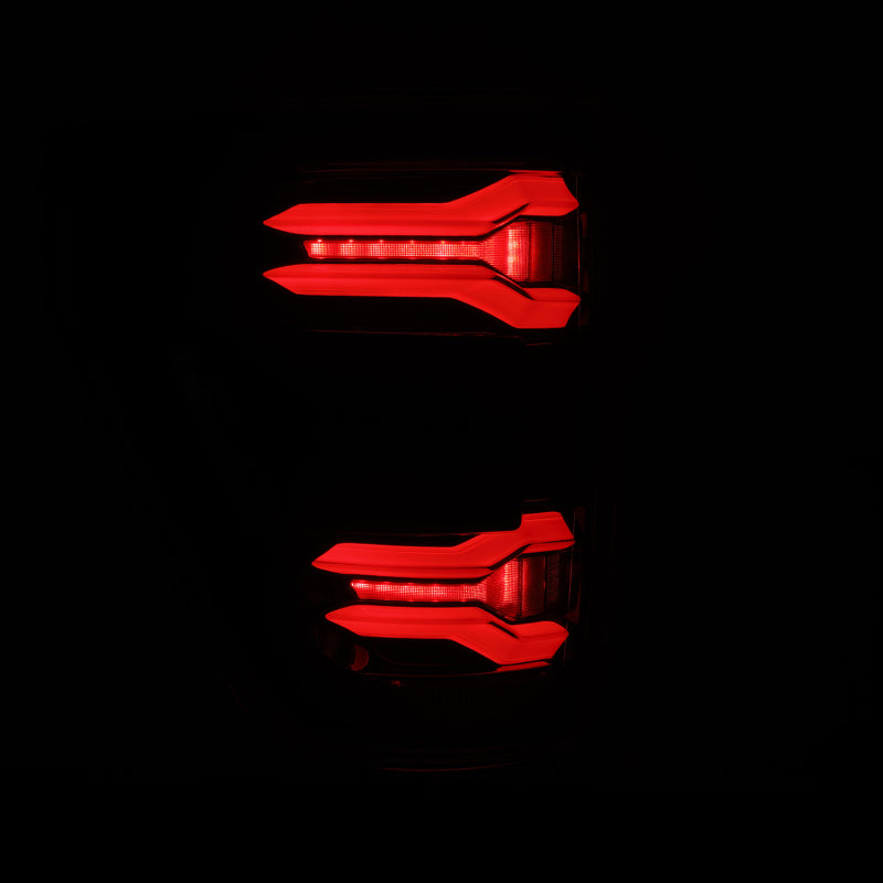 AlphaRex 21-23 Ford F-150 LUXX LED taillights in black with BLIS feature, showcasing a sleek and modern design.
