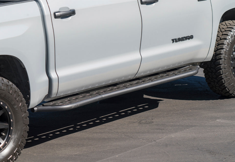 Cali Raised 14-21 Toyota Tundra Step Ed Rock Sliders - Kick Out/PowderCoat Plate/BedLiner
