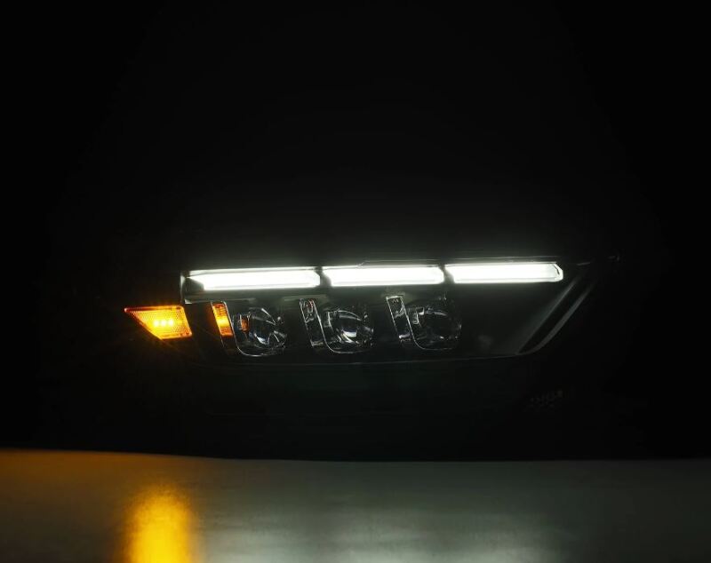 AlphaRex NOVA LED projector headlights for 15-17 Ford Mustang, featuring black housing, sequential signals, and daytime running lights.