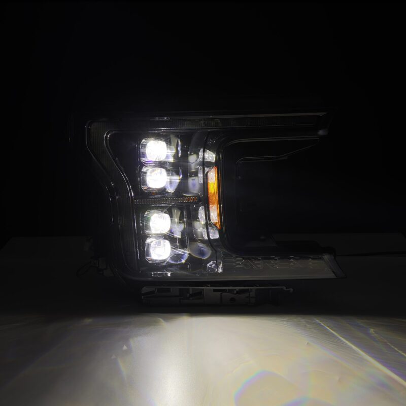 AlphaRex NOVA LED projector headlight for 2018-2020 Ford F-150, featuring a sleek black design and bright illumination.