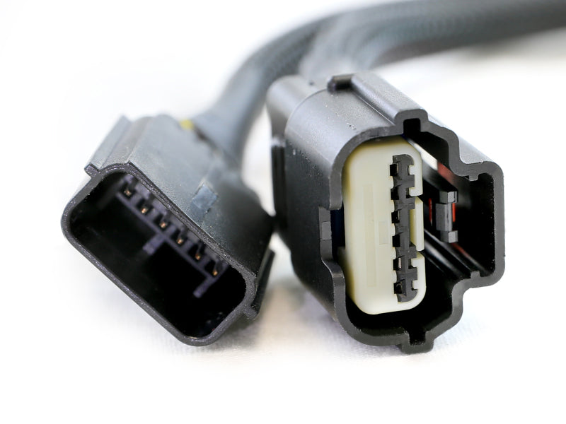 Throttle enhancer connector for GM Colorado/Canyon 2023-2025 L4-2.7L, designed for improved throttle response.